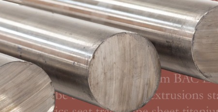 Extrusions, aircraft, aerospace, metal supplier, metals Close-up of cylindrical aircraft-grade aluminum rods from Future Metals with overlay detailing alloy type and specification.