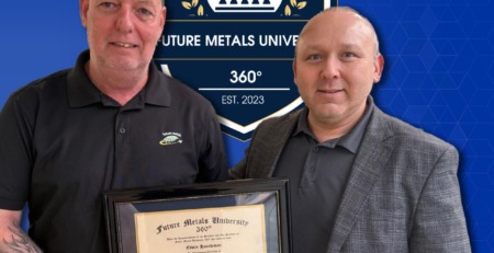 future metals Two men at Future Metals celebrate an aerospace-grade 6061-T6 aluminum alloy certification in front of the warehouse sign.